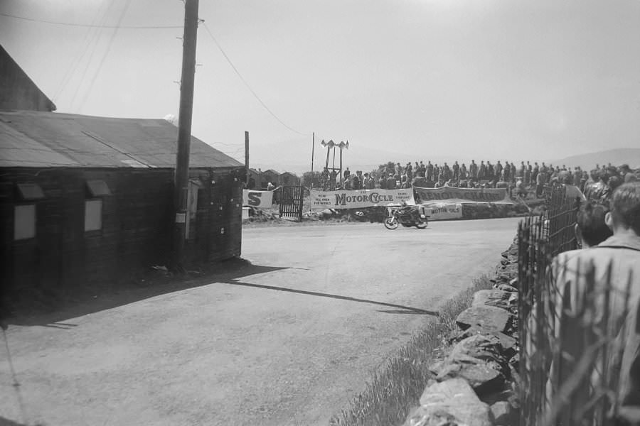 An unidentified rider passes Creg-ny-Baa, taken from a side road