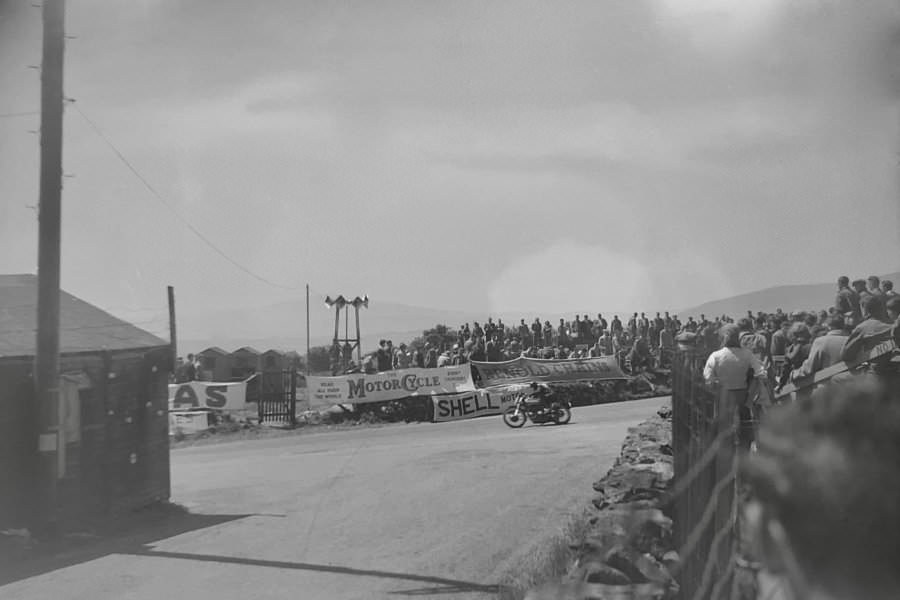 An second unidentified rider passes Creg-ny-Baa, taken from a side road